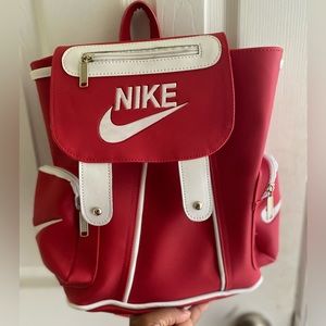 Red unofficial Nike mini backpack